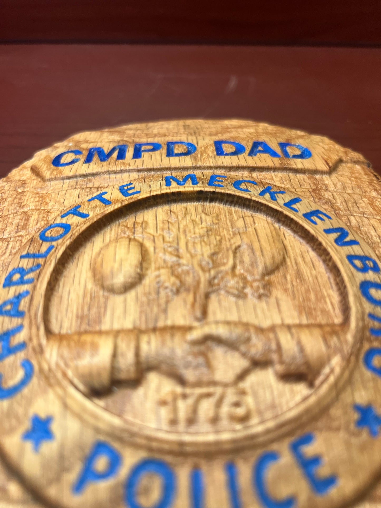 Wooden CMPD Badge